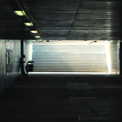 Empty alley along buildings