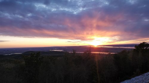 Panoramic view of sea against sky during sunset