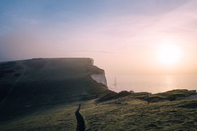 Scenic view of sea at sunset