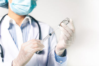 Midsection of man holding hands