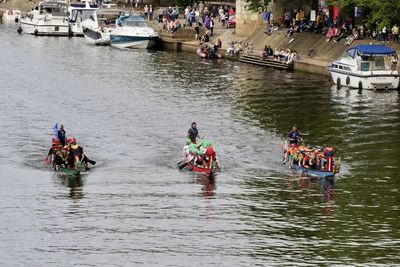 People on boat in river