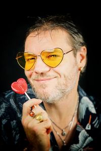 Portrait of happy man wearing sunglasses