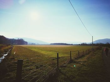 Scenic view of field against clear sky