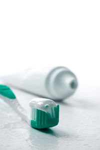 Close-up of dentures against white background