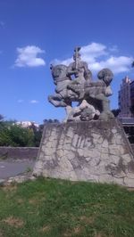 Low angle view of statue against sky