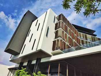 Low angle view of modern building against sky