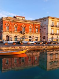 Reflection of building in canal