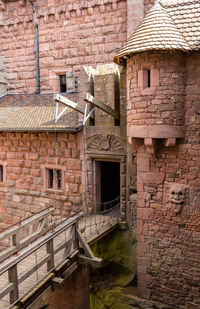 Old building against brick wall