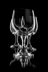 Close-up of drinking glass against black background