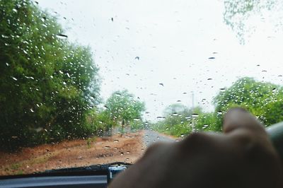 Road viewed through car windshield