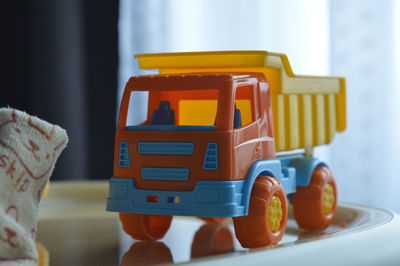 Close-up of toy car on table