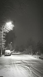 Cars on snow covered road