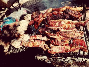 Close-up of meat on barbecue grill