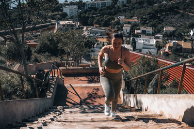 Girl running on the stairs person