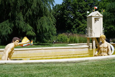 Statue of man in park