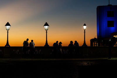 Silhouette of people and lampposts in tome de souza square in the city of salvador, bahia.