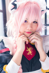 Portrait of young woman in traditional clothing