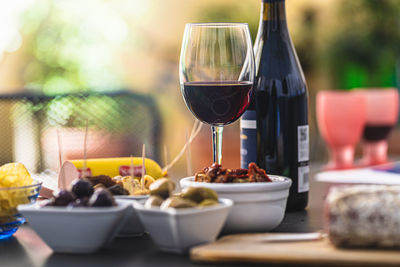 Close-up of wine in glass on table