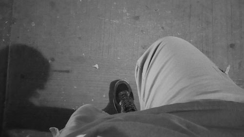 Low section of person standing on ground