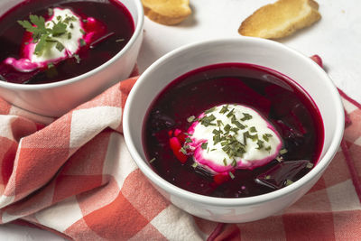 High angle view of soup in bowls on table