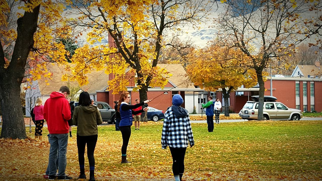 tree, lifestyles, leisure activity, men, rear view, person, autumn, walking, full length, casual clothing, togetherness, park - man made space, change, season, tree trunk, branch, girls, childhood