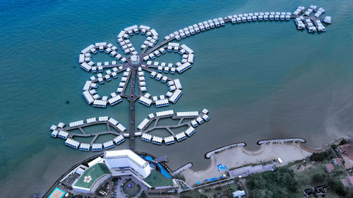 High angle view of ferris wheel in city