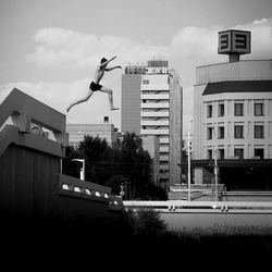 Buildings in city against sky