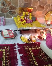 High angle view of people on table at temple