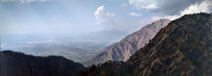Panoramic view of mountains against sky