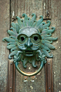 Close-up of antique door knocker