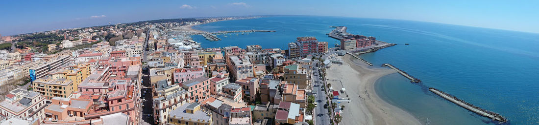 High angle view of city by sea