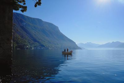 Boats in calm lake