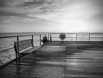 Pier over sea against sky