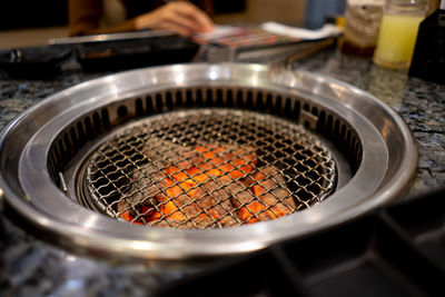 Close-up of coal in barbecue grill