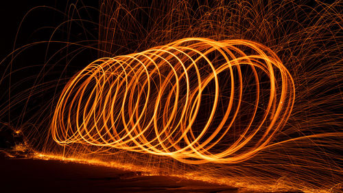 Light painting of firework display at night