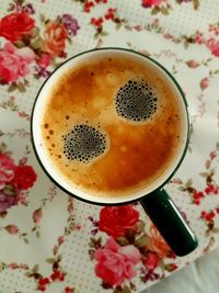 High angle view of coffee cup on table