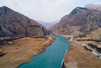 Scenic view of mountain range against sky