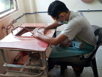 Young woman working at home