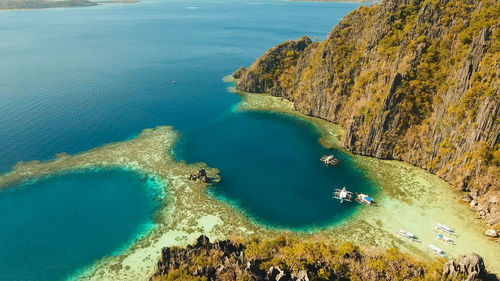 Aerial view twin lagoon, sea, beach. tropical island. busuanga, palawan, philippines.