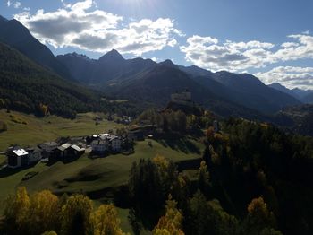 Scenic view of landscape and mountains against sky