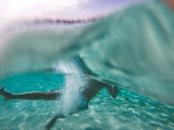 Close-up of person swimming in sea