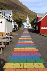 Rainbow street with church