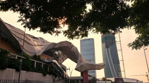 Low angle view of modern building against sky