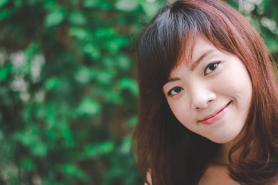 Portrait of smiling young woman