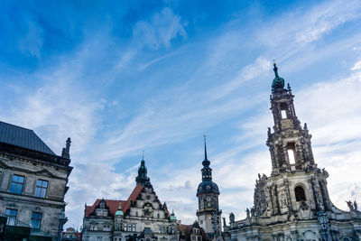 Low angle view of cathedral against cloudy sky