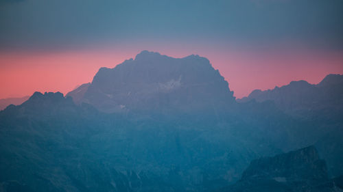 Scenic view of mountains against sky during sunset