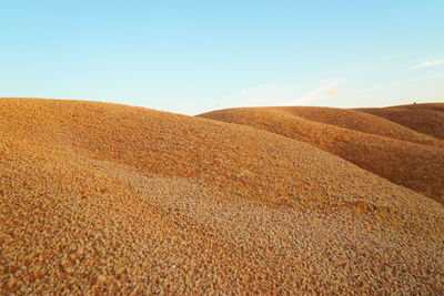 Scenic view of desert against sky