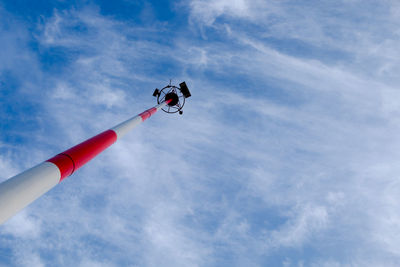 Transmission, antenna, radio tower pole on cloudy sky background