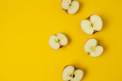 Directly above shot of food on yellow background