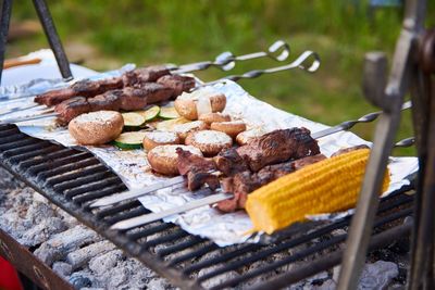 Close-up of meat on barbecue grill